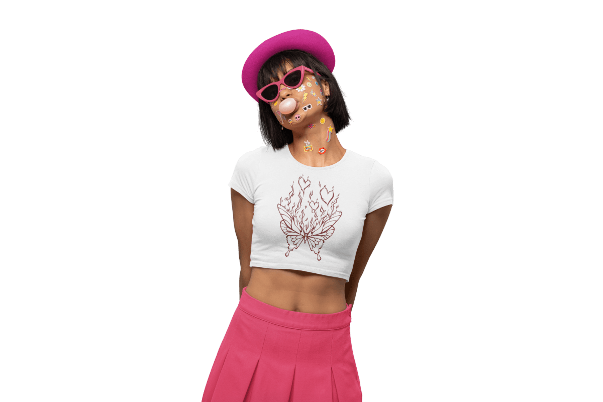 Woman wearing aesthetic graphic baby tee with Y2K butterfly hearts design