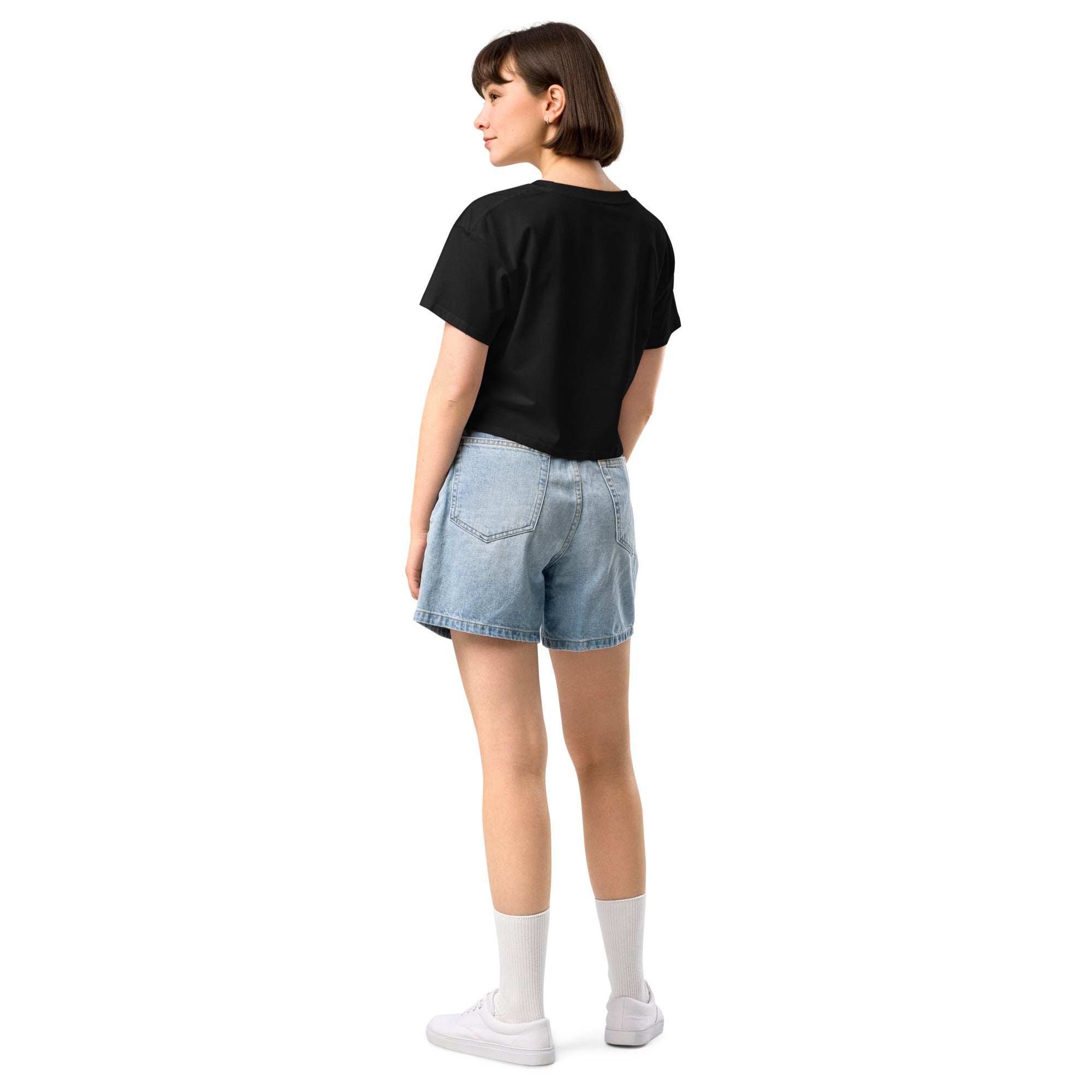 Back view of black relaxed fit crop top showing fit and length