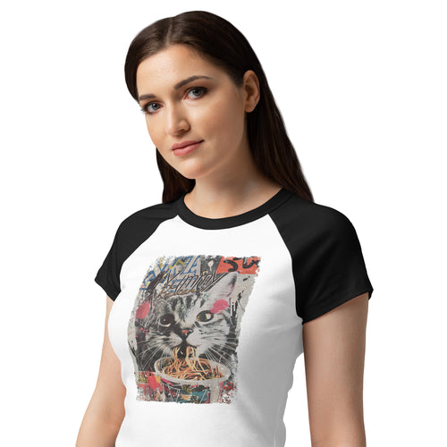 Woman wearing a white and black raglan baby tee with a cat eating ramen noodles graphic.